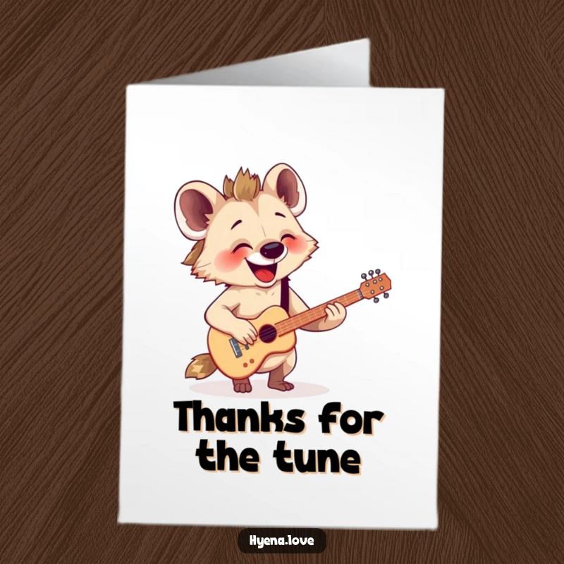Funny Free Printable Thank You Card: Happy hyena joyfully strums a tiny imaginary guitar, sending thanks musically.