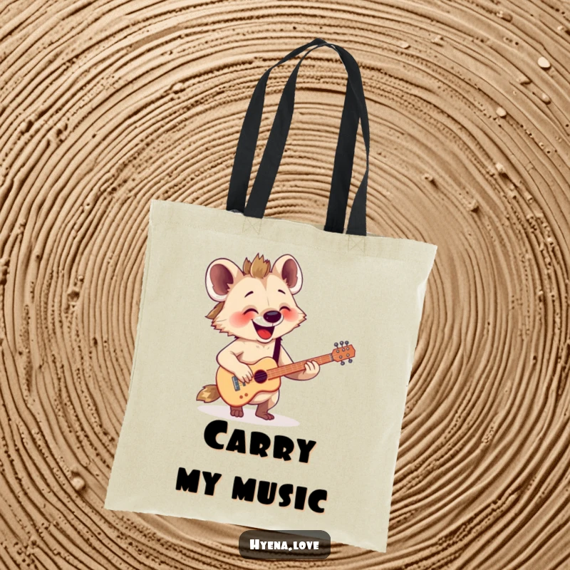 Funny Tote Bag: A happy hyena enthusiastically strums a tiny, imaginary guitar with a look of pure joy.